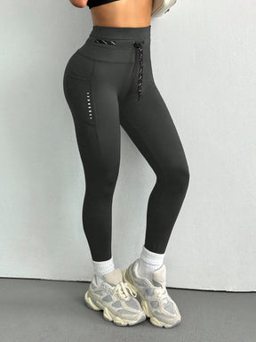 Legging Cintura Alta Com Bolso Lateral E Detalhe Estilo Fitness
