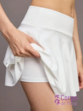 Conjunto Top e Saia Short Estilo Fitness Com Bolso Conjunto Top e Saia Short Estilo Fitness Com Bolso