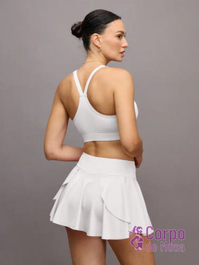 Conjunto Top e Saia Short Estilo Fitness Com Bolso Conjunto Top e Saia Short Estilo Fitness Com Bolso