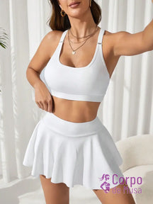 Conjunto Top e Saia Short Estilo Fitness Com Bolso Branco / PP Conjunto Top e Saia Short Estilo Fitness Com Bolso