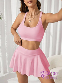 Conjunto Top e Saia Short Estilo Fitness Com Bolso Rosa Bebê / PP Conjunto Top e Saia Short Estilo Fitness Com Bolso