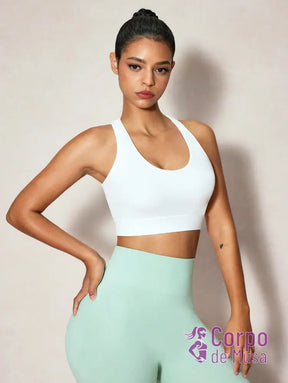 Top Alongado Decote U Com Costas Vazadas Estilo Training Top Alongado Decote U Com Costas Vazadas Estilo Training